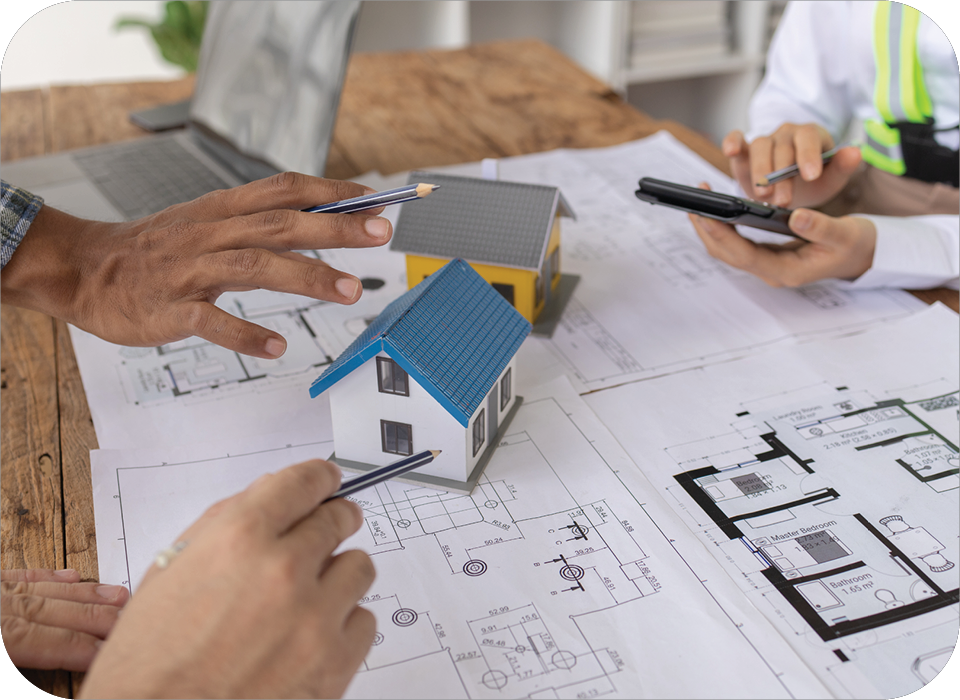 People reviewing plans for home renovations